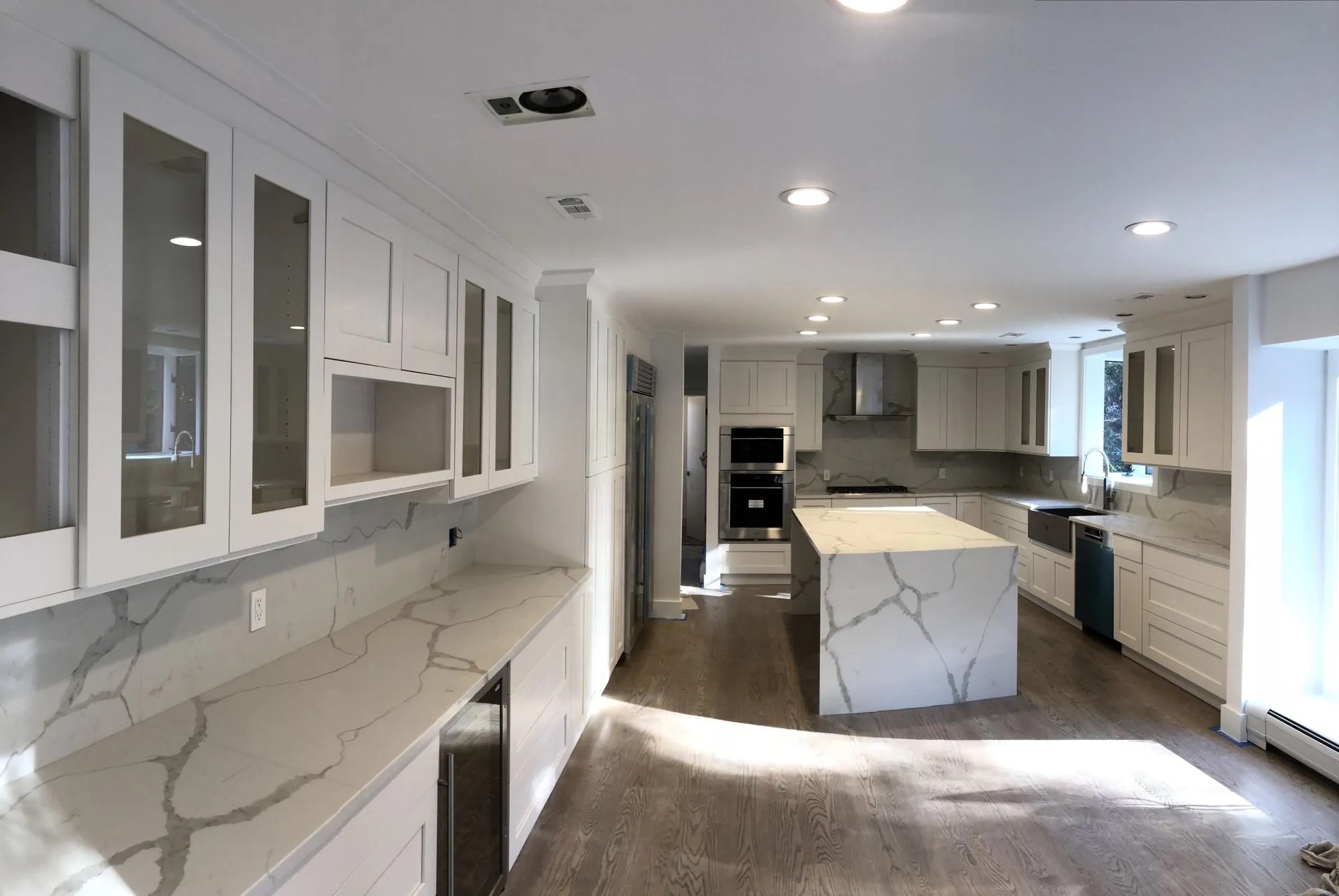 Luxury Kitchen with Calacatta Quartz in Alpine, NJ by Modern Heritage Remodelers